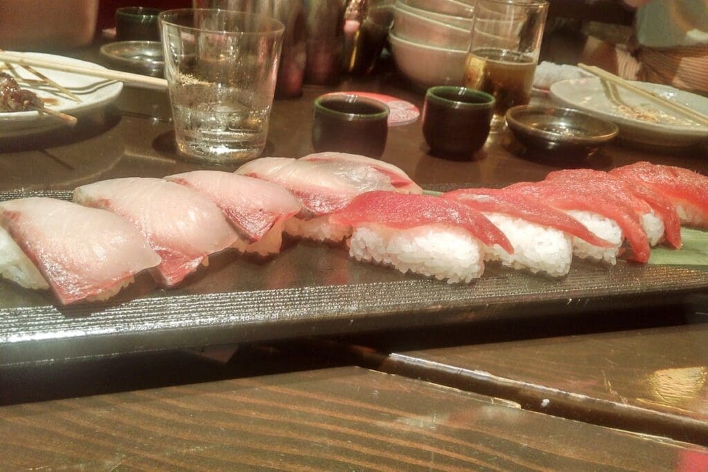 Plate of sushi on a table in a restaurant in Tokyo