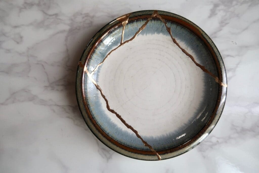 Small plate amended using the Japanese kintsugi repair technique
