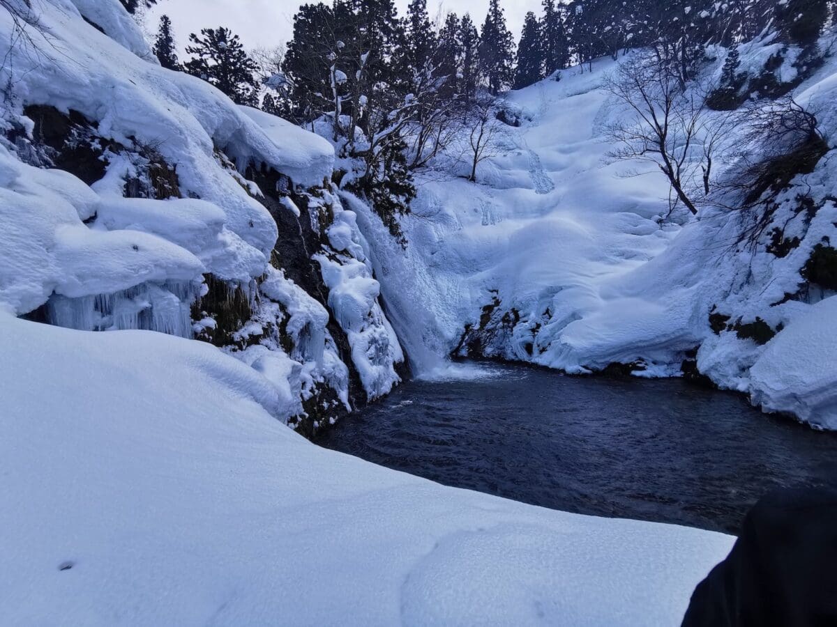 Shirogane Falls in winter at Ginzan Onsen